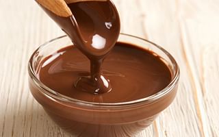 How can I melt chocolate on the stove if I don't have a double boiler?