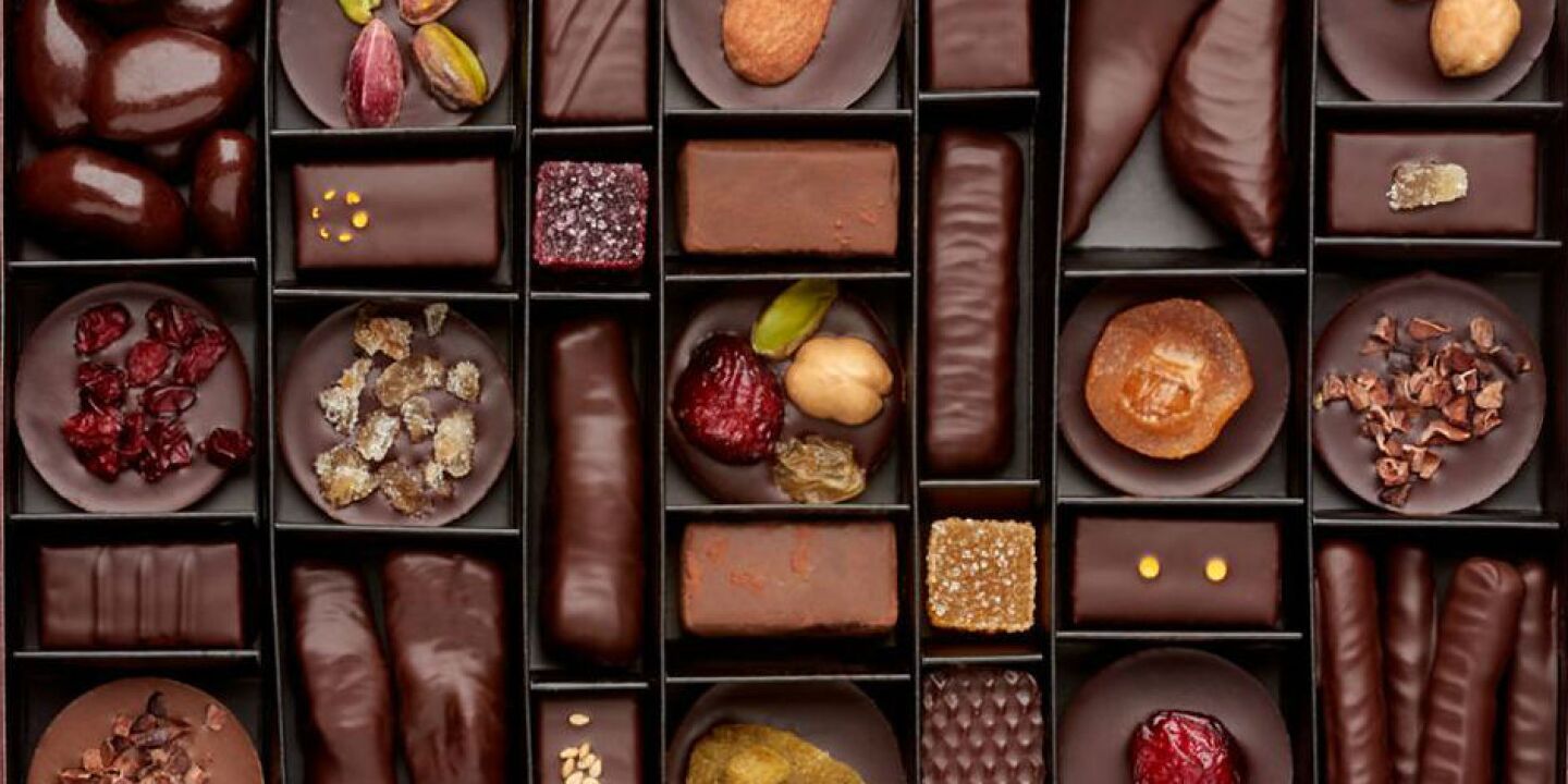 Assorted Belgian chocolates showcasing different shapes and flavors